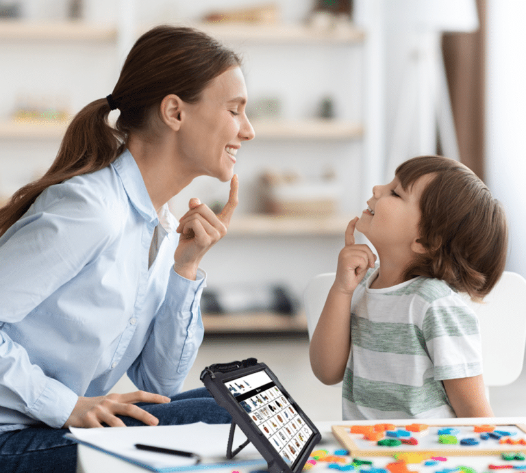 Mother and child engaging in interactive learning activities with communication tools.