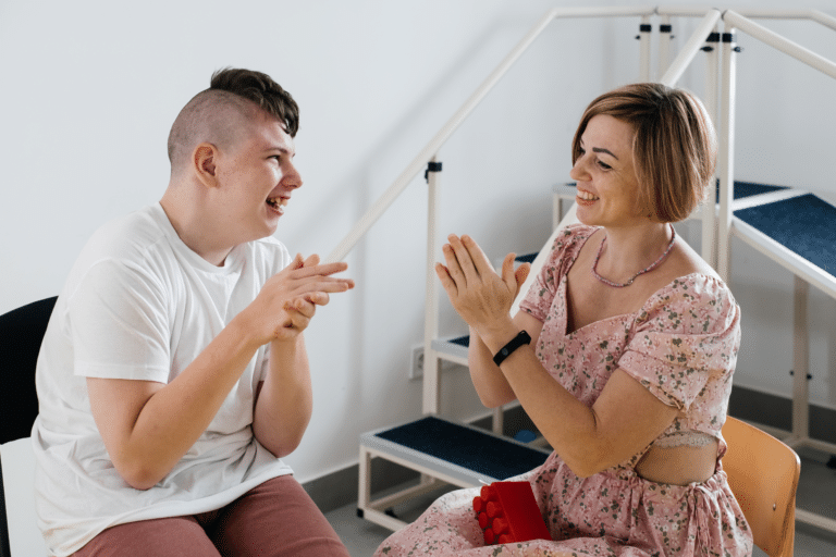 Engaging mother-child interaction during therapy and playtime for speech development.