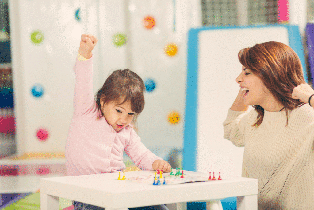 Children joyfully playing games together, sharing laughter and excitement.