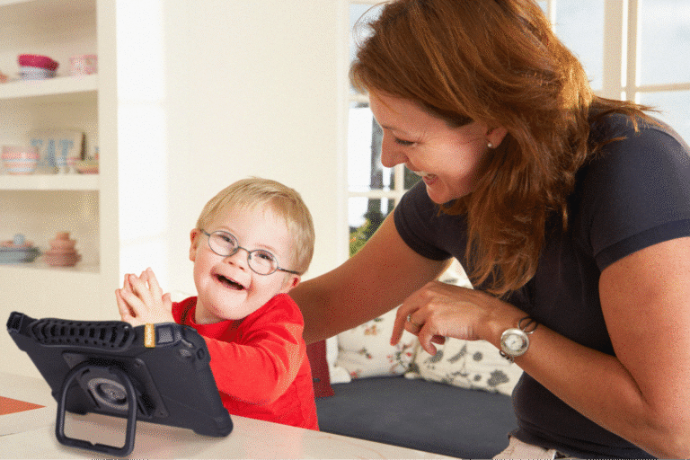 Woman and child enjoying quality time while using a tablet together.