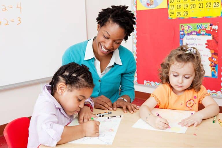 Children engaged in creative activities with a teacher in a vibrant classroom.