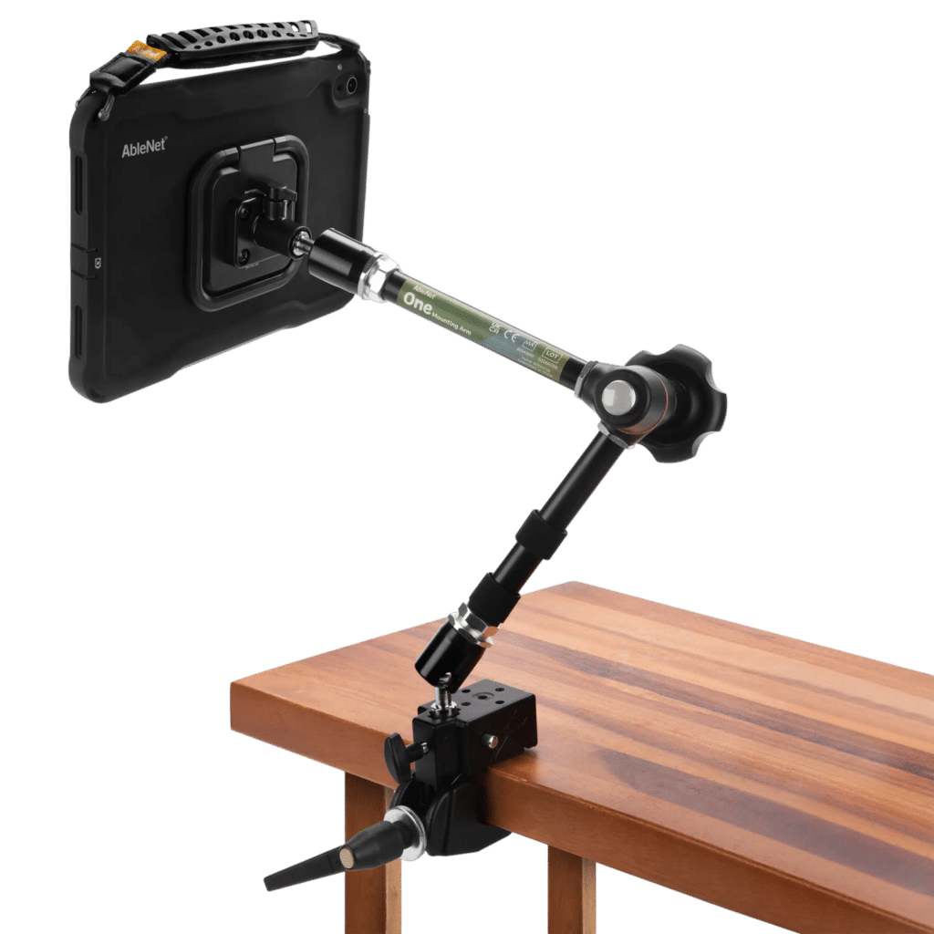 Adjustable tablet mount arm securely holds devices for optimal viewing and accessibility.