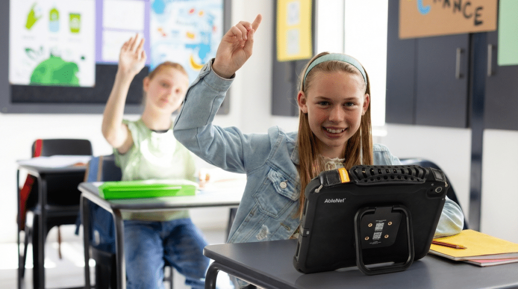 Engaged students enthusiastically participating in a modern classroom setting.
