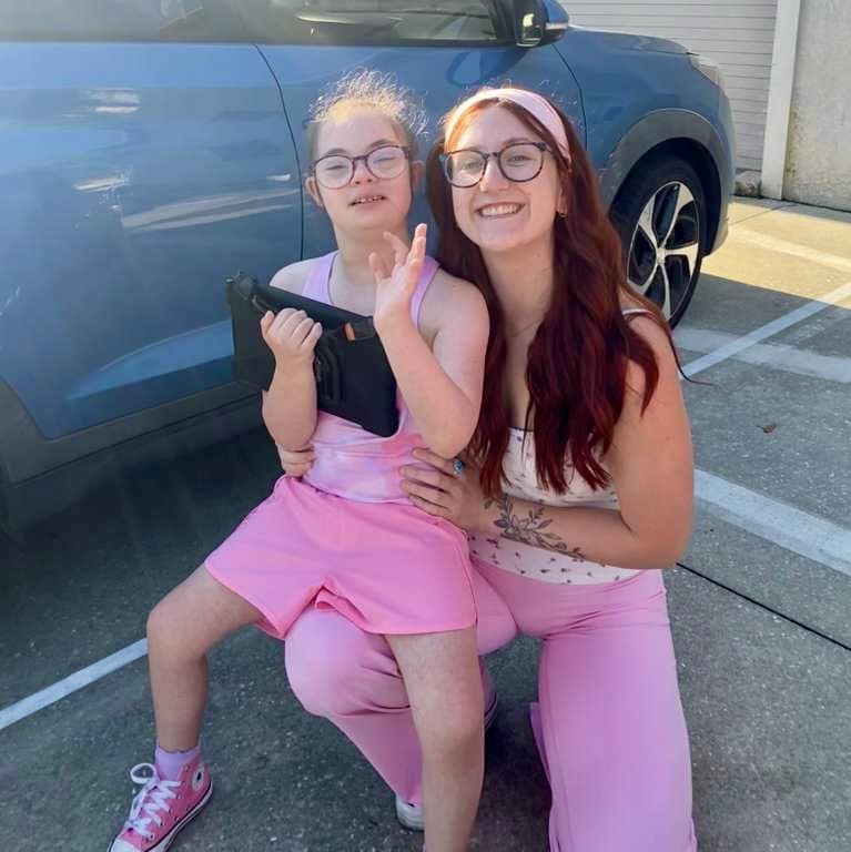 Joyful moments in pink outfits with smiles and laughter.