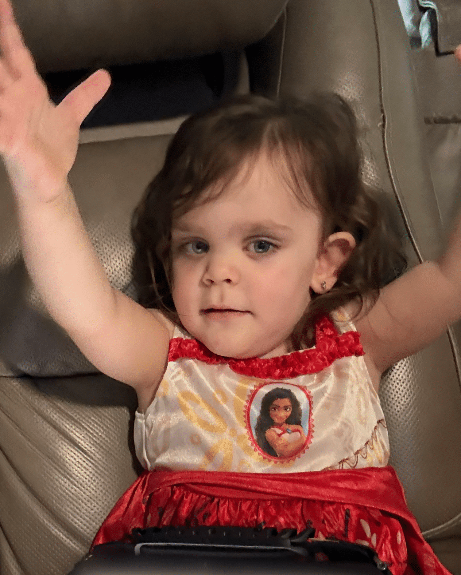 Child enjoying interactive play on a tablet, engaging with AbleFamilies content.