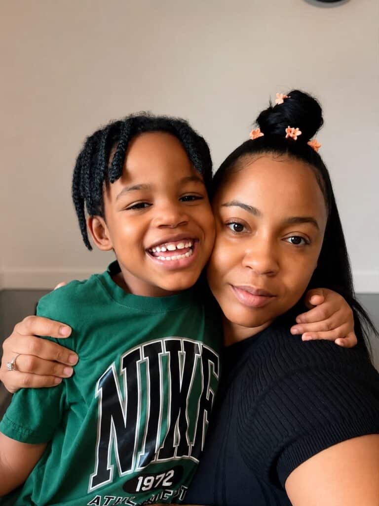 Joyful mother and son share a loving moment, celebrating able families together.