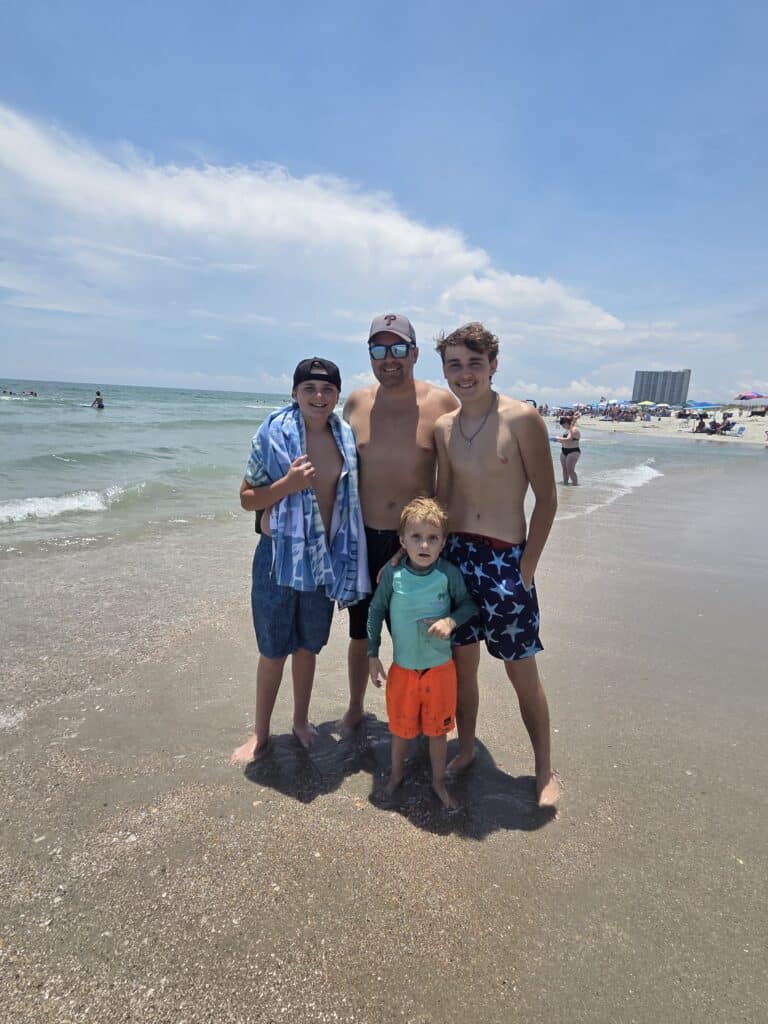 Families enjoying a fun day at the beach together with sun, sand, and smiles.