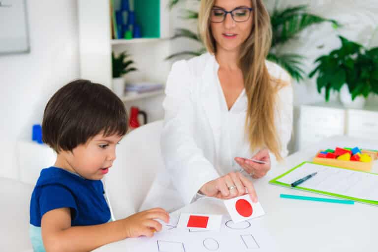Engaging SLP learning activity for kids with logic cards and playful interaction.