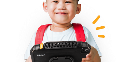 Happy kid holding a device, ready for learning and fun activities.
